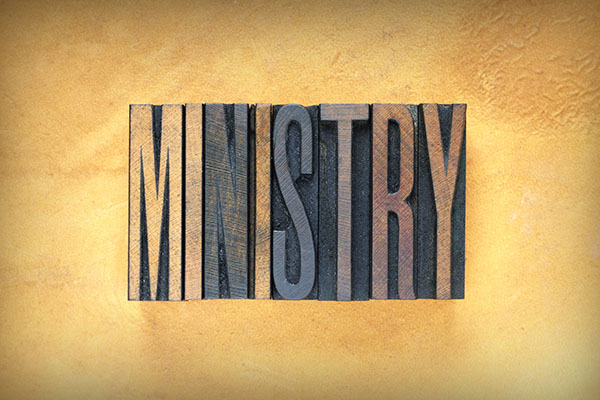 The word MINISTRY written in vintage letterpress type